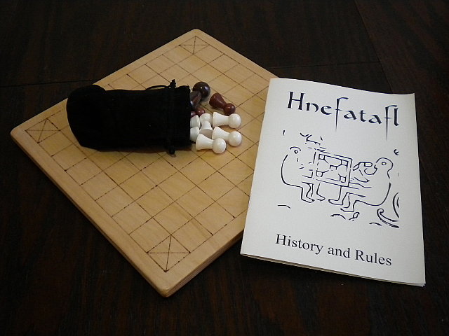 Classic 25-piece Hnefatafl Game getting ready for play
