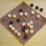 Hnefatafl, by Gothic Green Oak, with a game in progress.