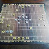 A RomBol hnefatafl game in progress.