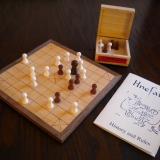 A game of sea battle tafl in progress on the Deluxe board.