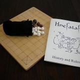 Classic 25-piece Hnefatafl Game getting ready for play